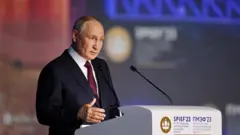 Путін