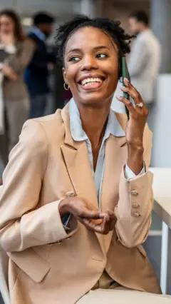 A woman in suit making call