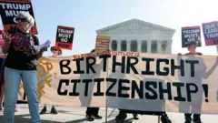 Pipo tanda outside court to protest di birthright citizenship order wey Trump sign for first day of second term for office.