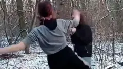 Скріншот відео з побиттям дічинки, яке поширили у соцмережах 