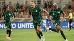 Nigeria midfielder William Troost-Ekong (C) celebrate afta e score im team first goal from penalty shot during di FIFA World Cup 2026 Africa qualifiers group C match between Lesotho and Nigeria for di Peter Mokaba Stadium for Polokwane on October 10, 2025. 