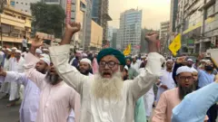 তফসিল ঘোষণার প্রতিবাদে গণমিছিল করেছে ইসলামী আন্দোলন নামের একটি রাজনৈতিক দল