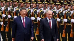 China-Russia Ties Deepen; Ebola Outbreak Challenges Global Health; LINE's Anti-Impersonation Tech; Sanctions Adjust on Russian Oil; Taiwanese Celebrity Ventures into Niche Markets