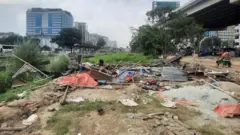 ঢাকার খিলক্ষেতে উচ্ছেদ করা মন্দিরের ভাঙা স্থাপনা
