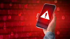 celular com símbolovbet romania'alerta' na tela 