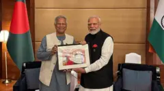 মুহাম্মদ ইউনূস ও নরেন্দ্র মোদী