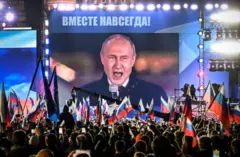 Putin'in ilhak kararını açıklamasının ardından ülkenin başkenti Moskova'daki Kızıl Meydan'da kutlamalar düzenlendi