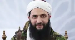 2016 मध्ये एक रेकॉर्डेड संदेश देताना अबू मोहम्मद अल-जुलानी
