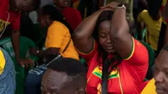 Foto of disappointed Ghana fans