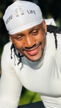 A man smiling for the camera