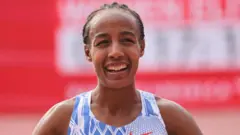 Atileet Siifan Hasan Olompikii Tookiyoo irratti warqii lamaafi nahaasa tokko injifattee turte