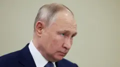 Путін