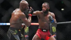 Leon punch Usman for face