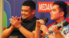 Gibran Rakabuming Raka (kanan) menyampaikan paparan bersama Wali Kota Medan, Bobby Nasution (kiri).