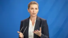Danish PM Mette Fredericksen gives a speech