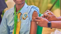 A teenager receiving HPV vaccine