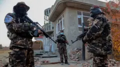 Taliban soldiers in the outskirts of Kabul earlier this month. The group has been accused of carrying out revenge killings.