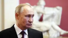Путин