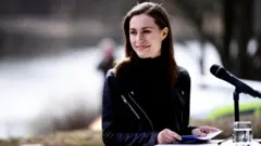 Sanna Marin speaking to reporters