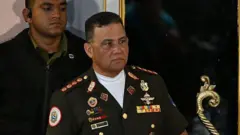 El ministro Gustavo González López en un acto en Caracas