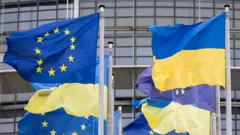 Флаги Украины и ЕС в Брюсселе