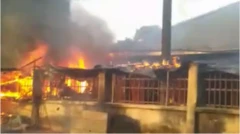 Izombe market dey burn