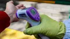 температура