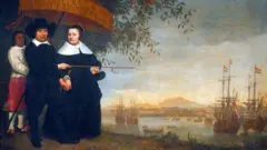 Sebuah lukisan yang memperlihatkan pejabat VOC dan istrinya di Batavia, yang dipayungi oleh salah-seorang budaknya. Diperkirakan lukisan ini dibuat antara 1640-1660. 