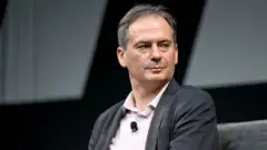 Christo Grozev speaking at an event in New York in September 2022