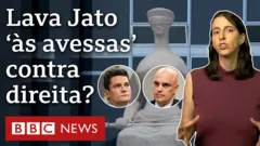 Estátua de pessoa com venda nos olhos e rostos de Sergio Moro e Alexandre de Moraes