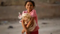 فتاة سورية