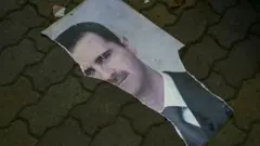 تصویر پاره شده بشار اسد