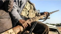 Agbebọn to gbe ibọn lọwọ