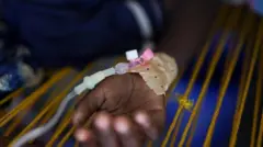 ጉሉኮስ የተሰካለት እጅ