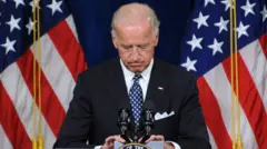 Joe Biden looks down