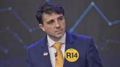 Renan Santos em debate presidencial promovido pela Band.
