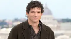 Американський актор Крістофер Ештон Катчер під час фотосесії трилера "Краса" в готелі Hotel de la Ville. Рим (Італія), 19 січня 2026 року.