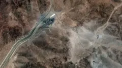 A satellite image shows new airstrike craters on the perimeter of the Fordow Fuel Enrichment Facility, amid the Iran-Israel conflict, near Qom, Iran, June 24, 2025