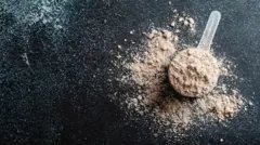 Dosador de plástico com proteina em pó