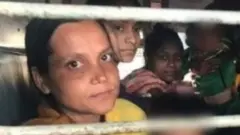 ব্যাঙ্গালোর থেকে আটক ব্যক্তিদের ট্রেনে করে কলকাতায় আনা হয়।