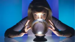 Magician staring into a crystal ball
