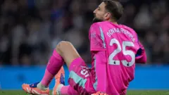 Manchester City goalkeeper Gianluigi Donnarumma sitting on the floor during their Premier League game against Leeds United in November
