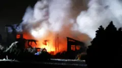 یکی از خانه‌های آسیب دیده در آوموری در جریان زلزله دوشنبه شب