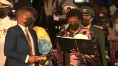 Live stream image shows Dame Sandra Mason being sworn in