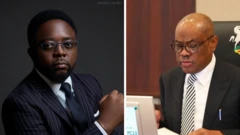 Channels TV host, Seun Okinbaloye and FCT Minister Nyesom Wike. Two of dem wear suite