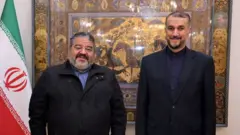 حسین امیرعبدالهیان وزیر خارجه ایران و غلامرضا جلالی رئیس سازمان پدافند غیرعامل