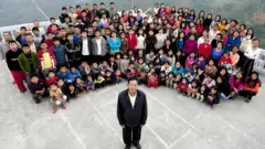 Ziona Chana and his family in a photograph from 30 January, 2011