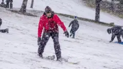 A snowboarder in California