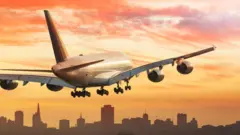 Airbus A380 flying in the sky over San Francisco