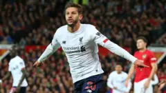 Adam Lallana celebrates